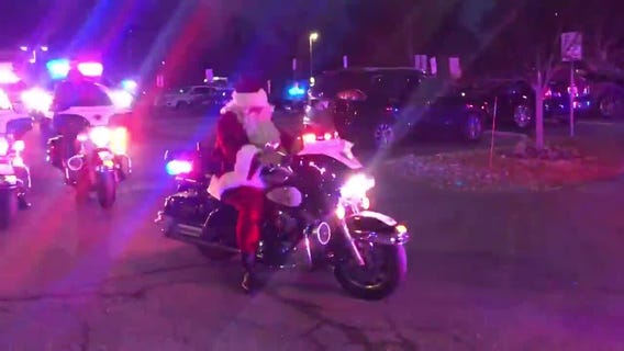 Santa arrives at the Children's Inn at NIH