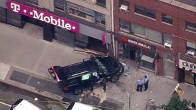 SUV hits building