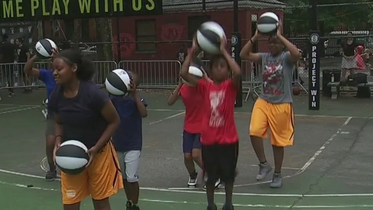 Brooklyn Nets give away basketballs