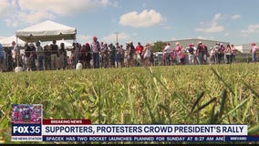 Supporters, protesters crowd President Trump's Ocala rally