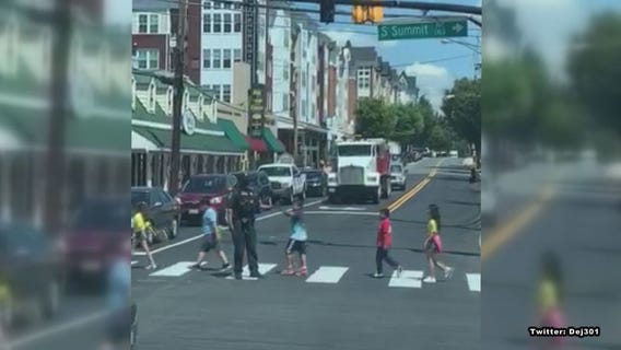 Montgomery County officer seen high-fiving elementary kids at crosswalk