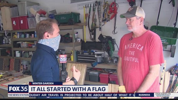 Former Disney employee constructs wooden flags