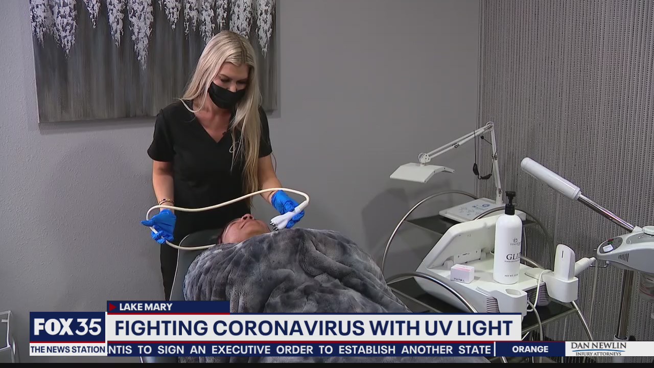 Esthetician using UV lights to sanitize against COVID-19
