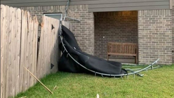 Strong winds cause trampoline to smash into home in Houston