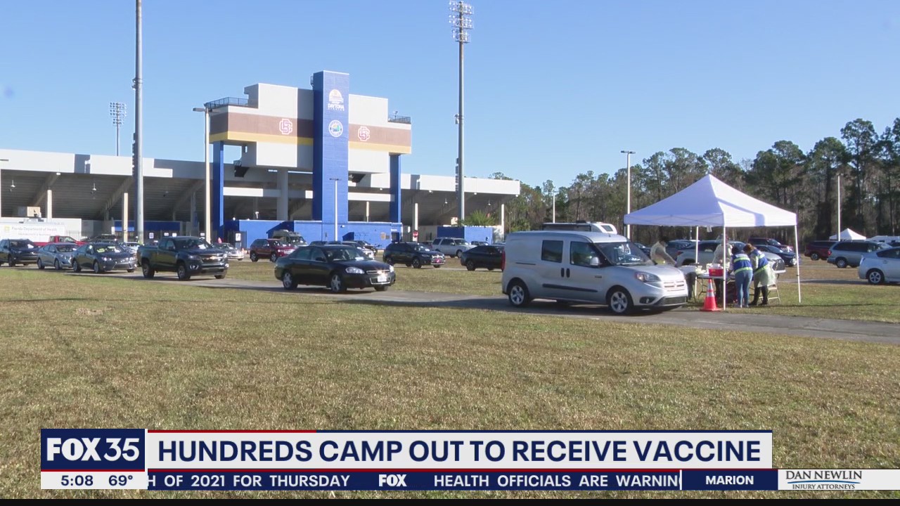 Hundreds who camped out for COVID-19 vaccine receive shot