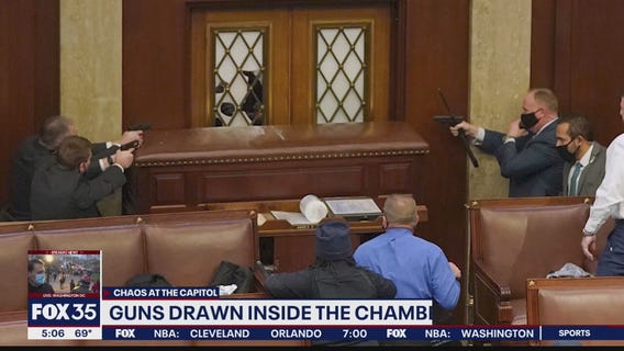 Guns drawn as protesters stormed Capitol