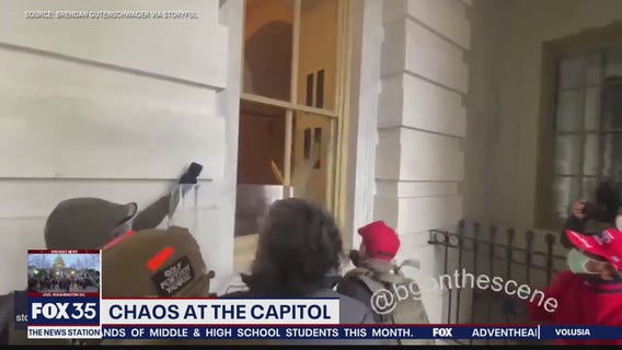Protesters smash windows as lawmakers hunker down