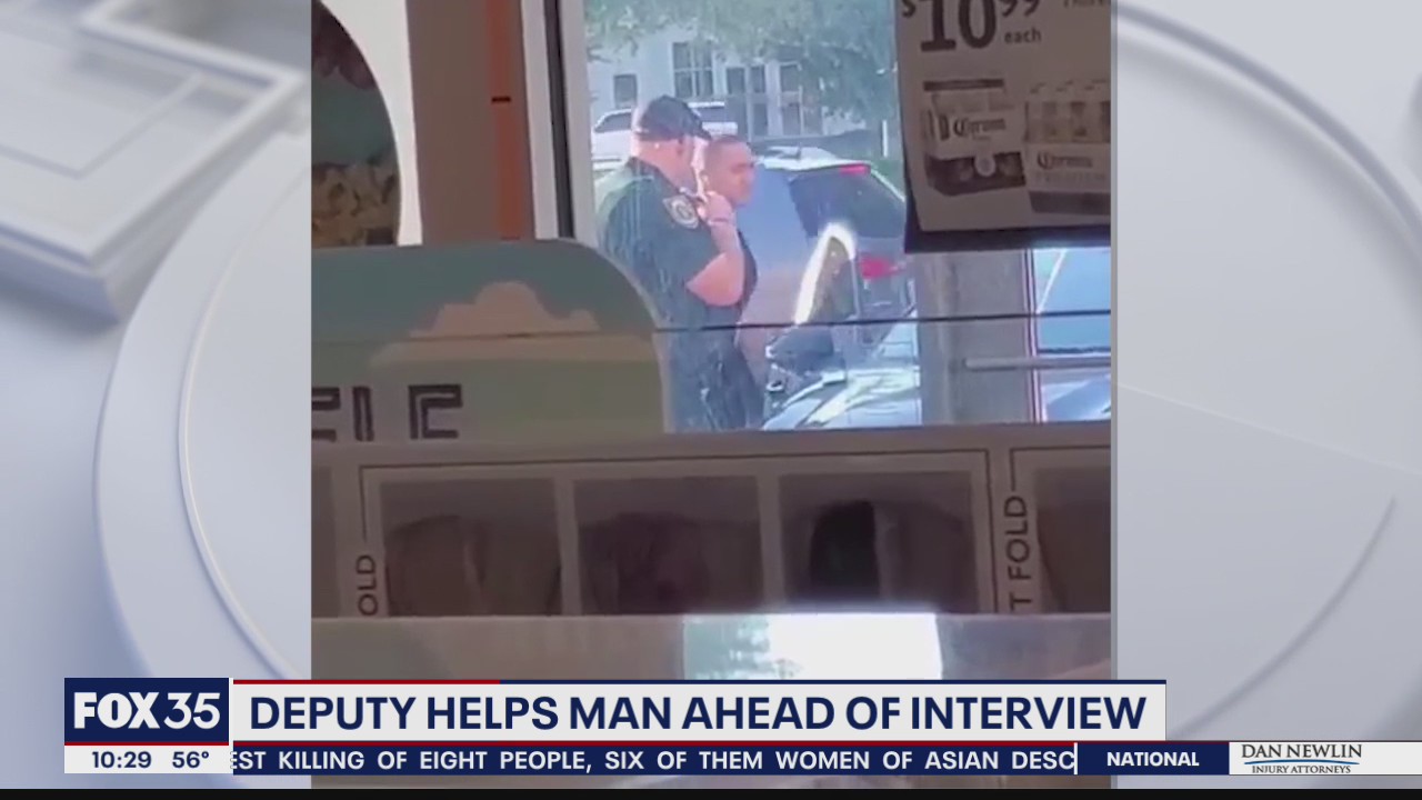 Seminole County deputy helps young man with tie ahead of interview