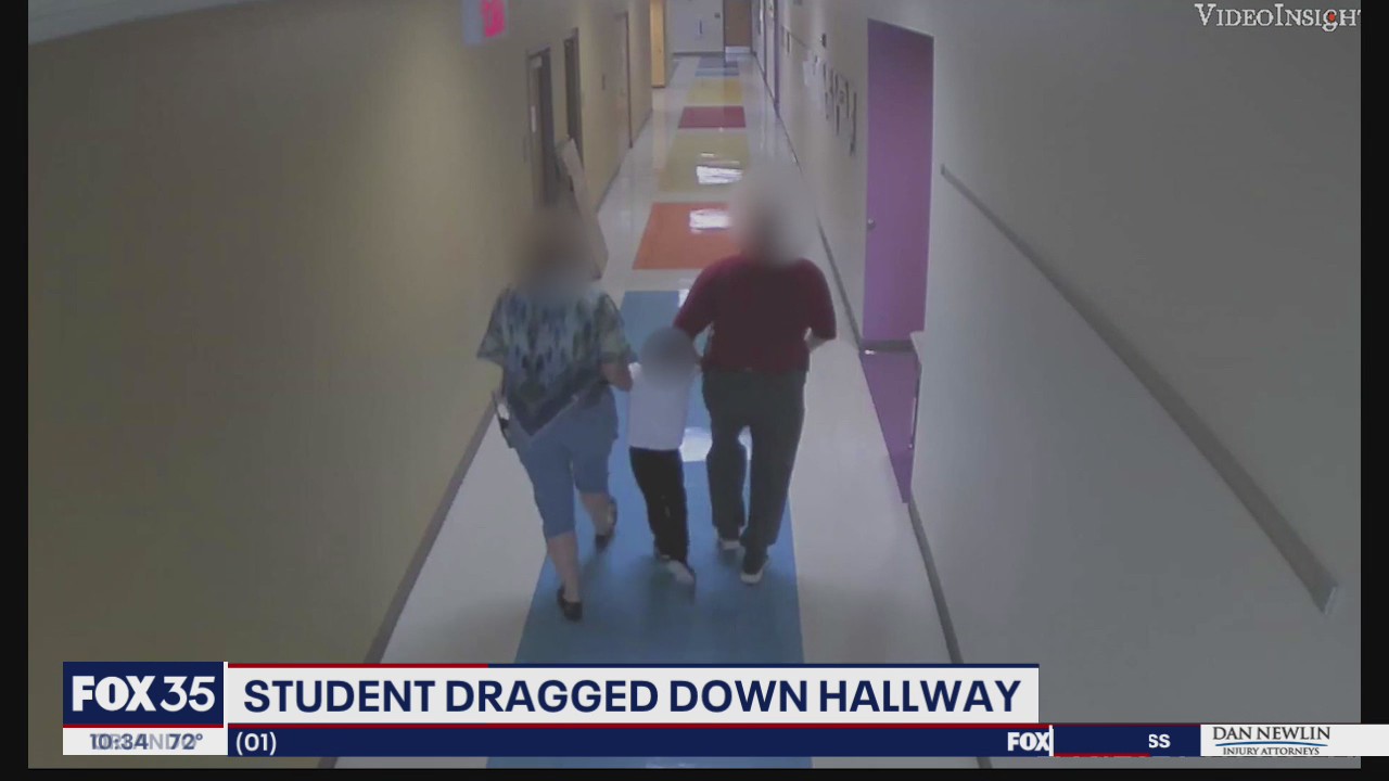 Parents say child was dragged down school hallway by employees
