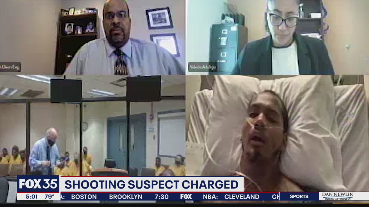 Sanford shootout suspect makes first appearance from hospital bed