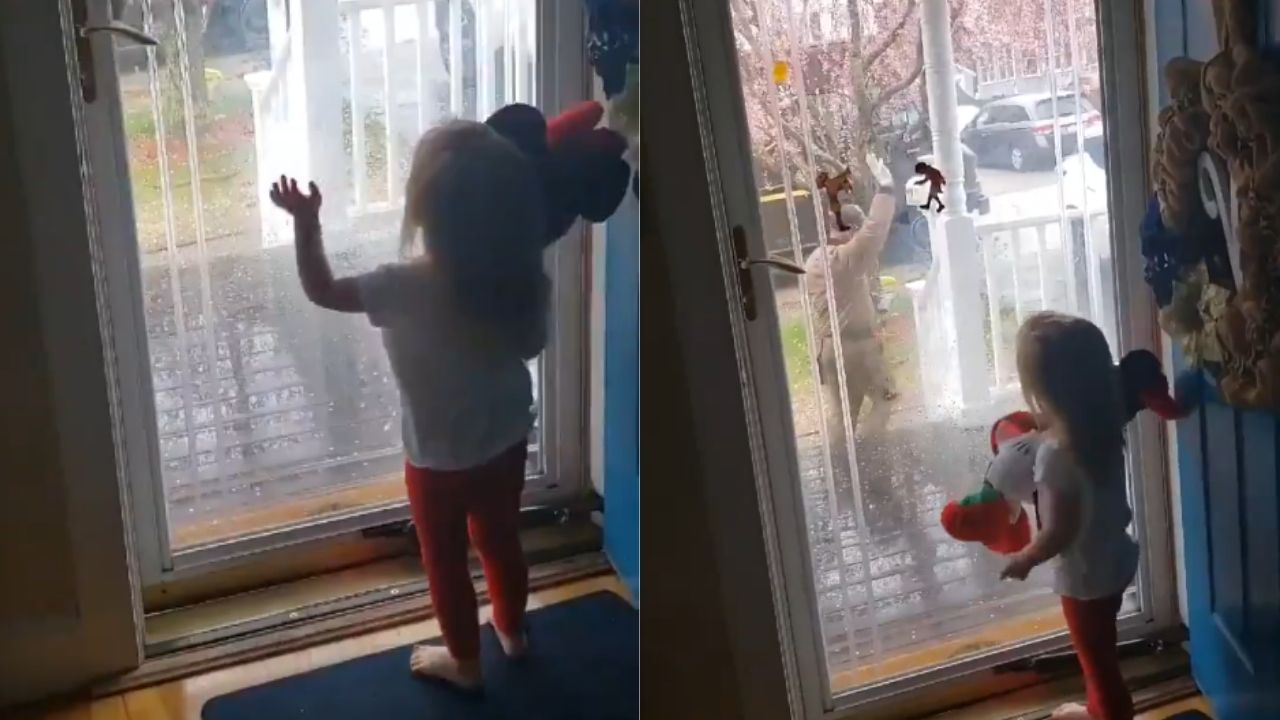 Little girl greets UPS delivery man