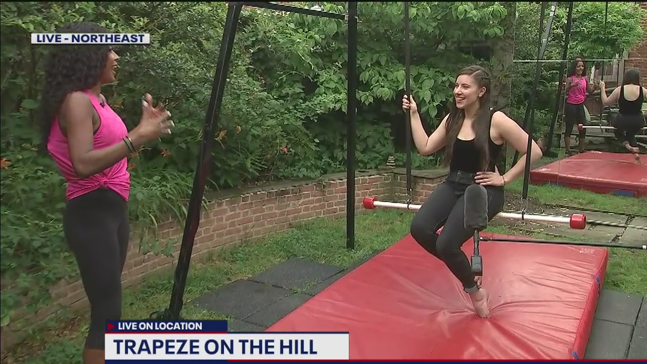 Local trapeze artist shows off backyard DC studio