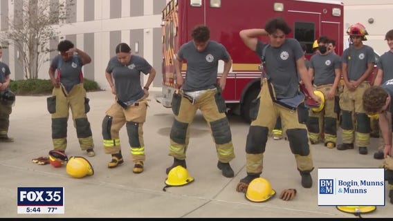 High school students train to become firefighters