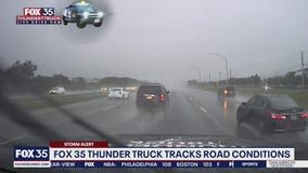 FOX 35 Storm Team Thunder Truck tracks rainy road conditions