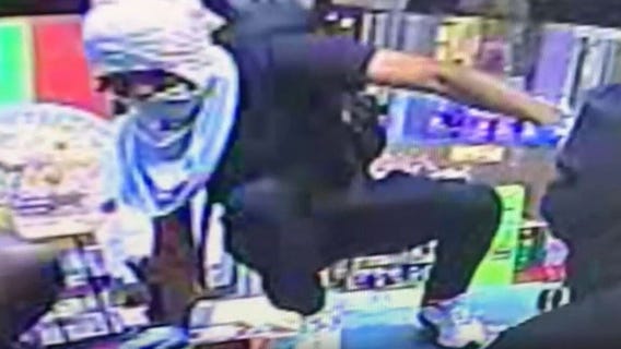 Video shows suspect climb over Gaithersburg gas station counter