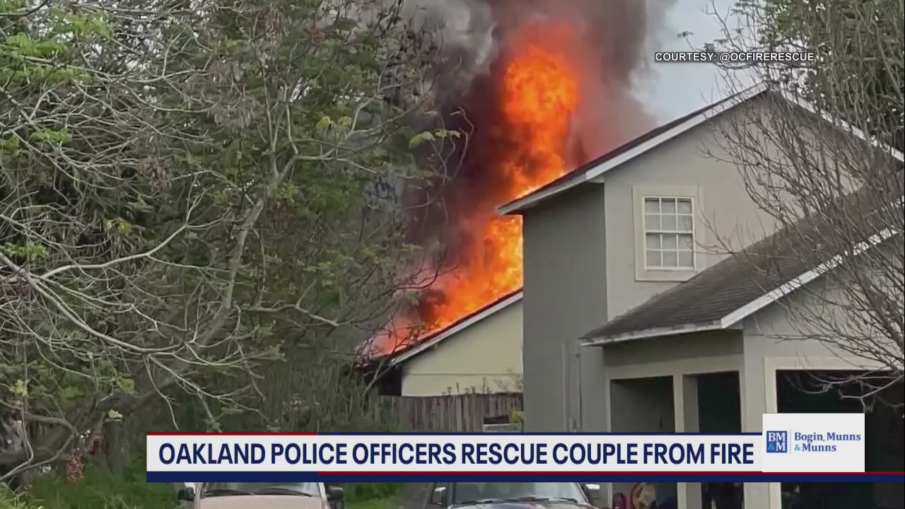 Florida officers honored for saving couple from home fire