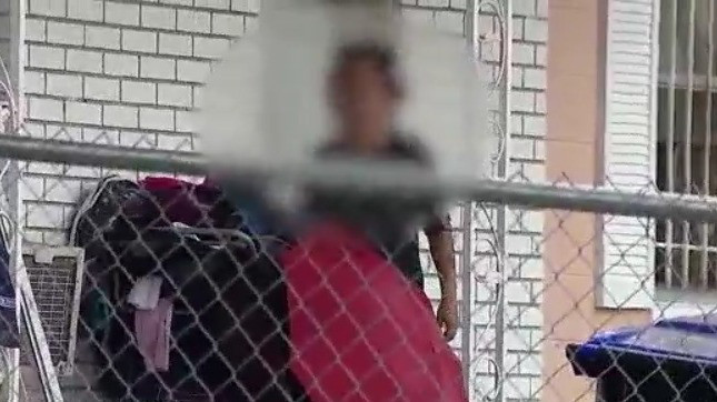 How strangers were living in a woman's home