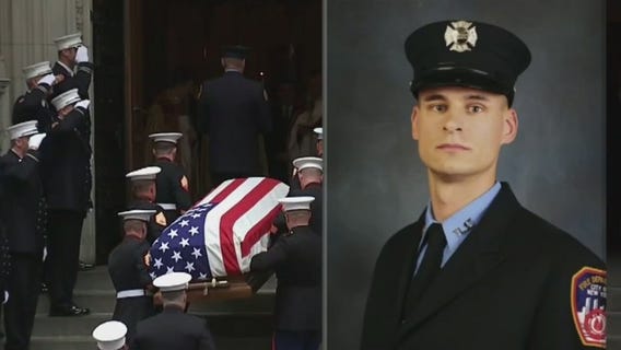 Slutman funeral: A hero honored