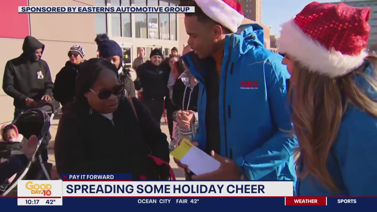 Pay It Forward: Handing out gift cards to spread holiday cheer