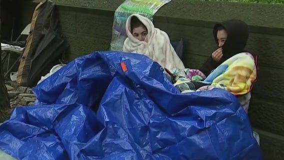 BTS fans camp out in the rain
