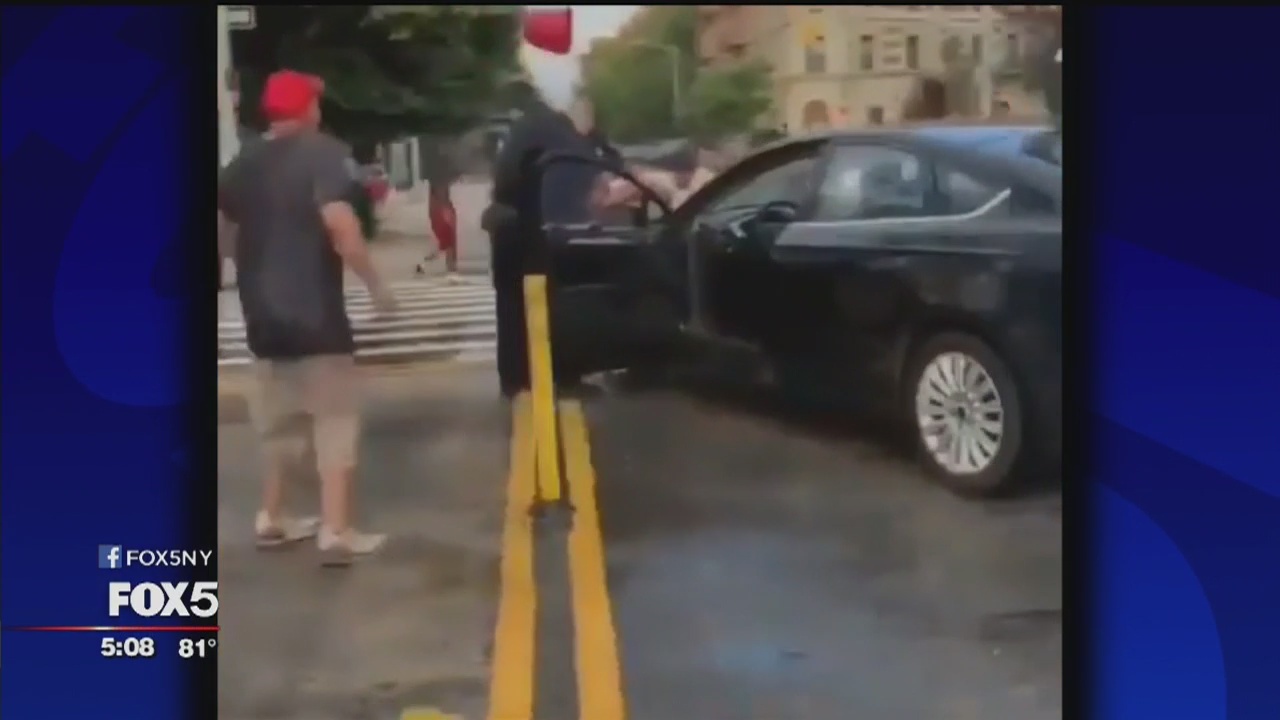 Arrest made in videotaped dousing of NYPD officers
