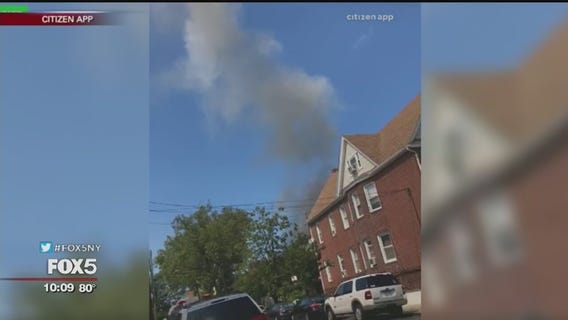 Traffic agent hailed as a hero for saving family from fire