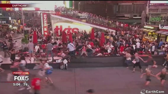 Police: Motorcycle backfiring causes panic in Times Square