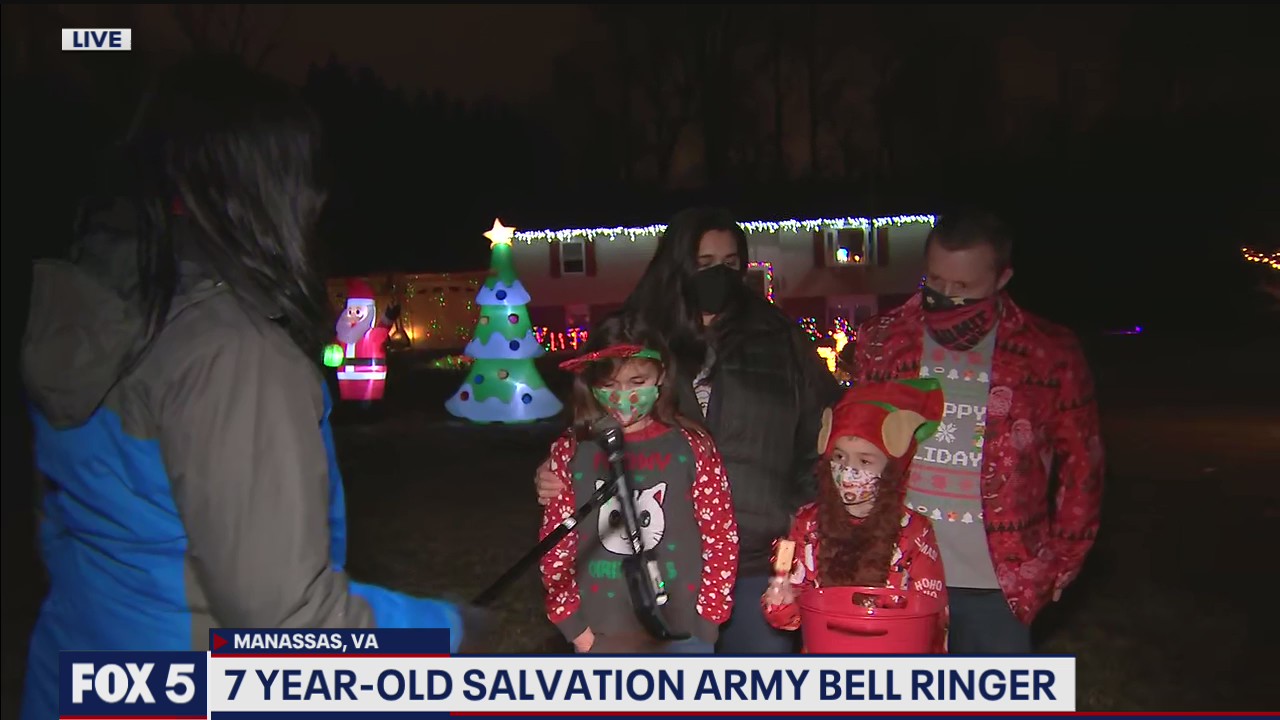 7-year-old bell ringer helping the Salvation Army
