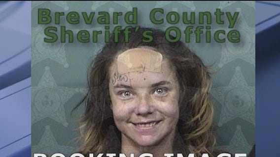 Woman accused of beating mom, stealing car