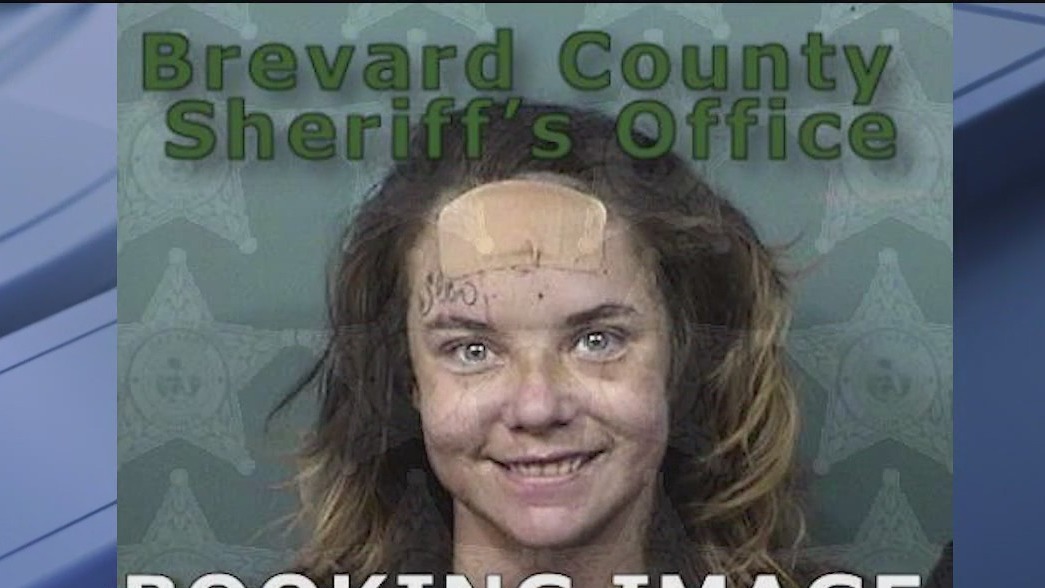 Woman accused of beating mom, stealing car