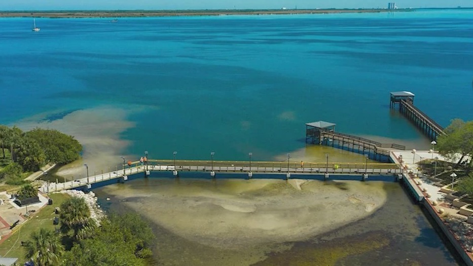 Sewage surrounds new Titusville walkway