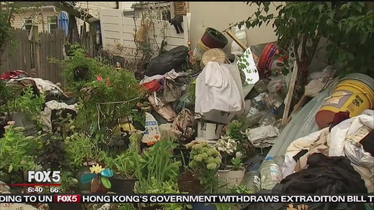 Queens home exterior resembles 'makeshift landfill'