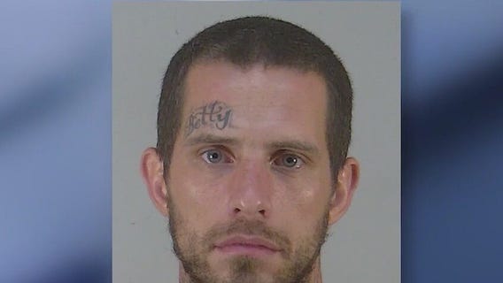 Escaped inmate found hiding in woman's car