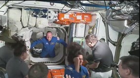 Astronauts land at ISS despite helium leaks