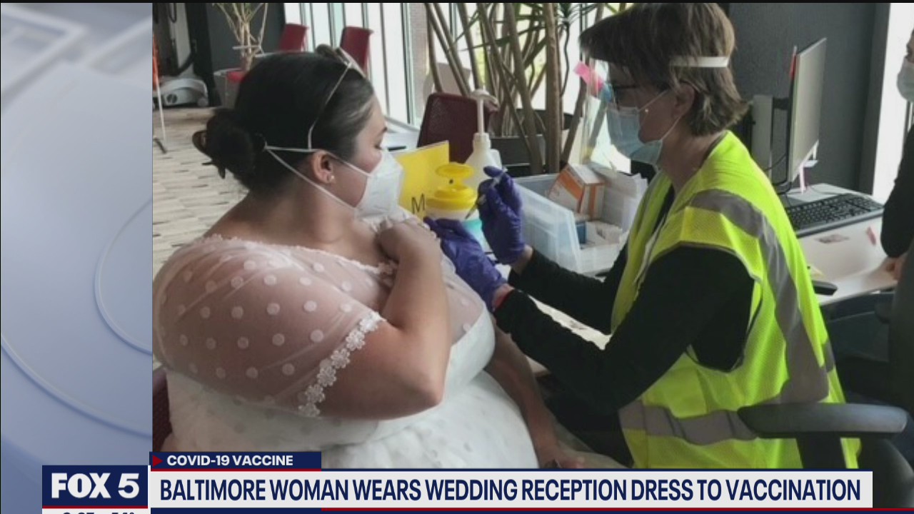 Maryland woman wears wedding gown to COVID-19 vaccination
