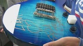 Autographed guitar for teen recovering from cancer