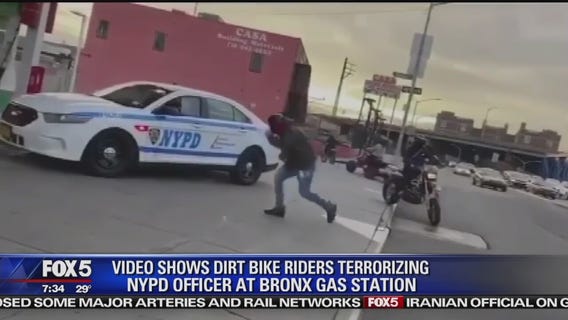 Bikers, ATV riders surround lone cop