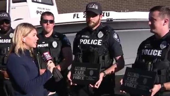 Officers honored for rescuing pregnant woman from sinking car