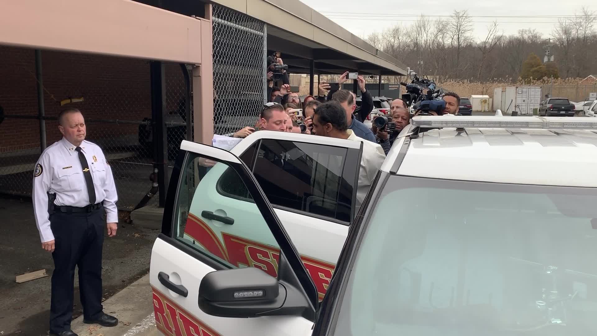 Hanukkah stabbing suspect Grafton E. Thomas, 37, is taken into police custody