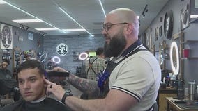 Veteran returns to cutting hair after serving