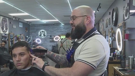 Veteran returns to cutting hair after serving
