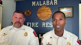 Hero firefighters rescue dog from canal