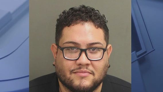 Man arrested after allegedly pointing gun at family during road rage