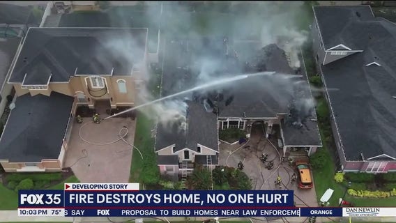 Large home burns in Sanford neighborhood