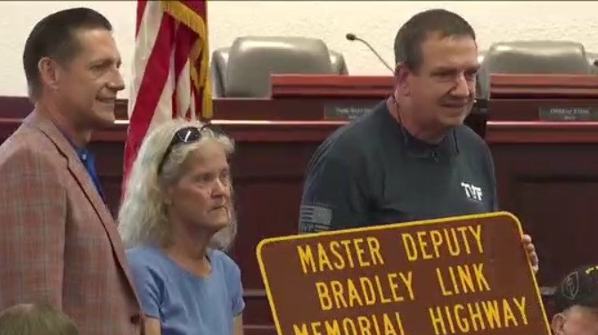 Deputy killed in ambush honored with road-renaming