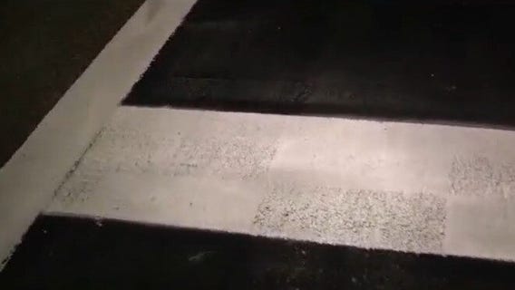 Crews repaint checkered flag crosswalk in Daytona
