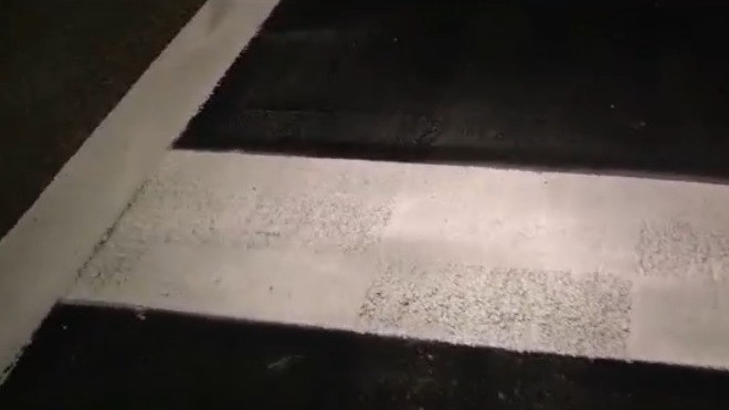 Crews repaint checkered flag crosswalk in Daytona