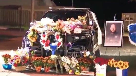 Growing memorial for fallen Edgewater police officer