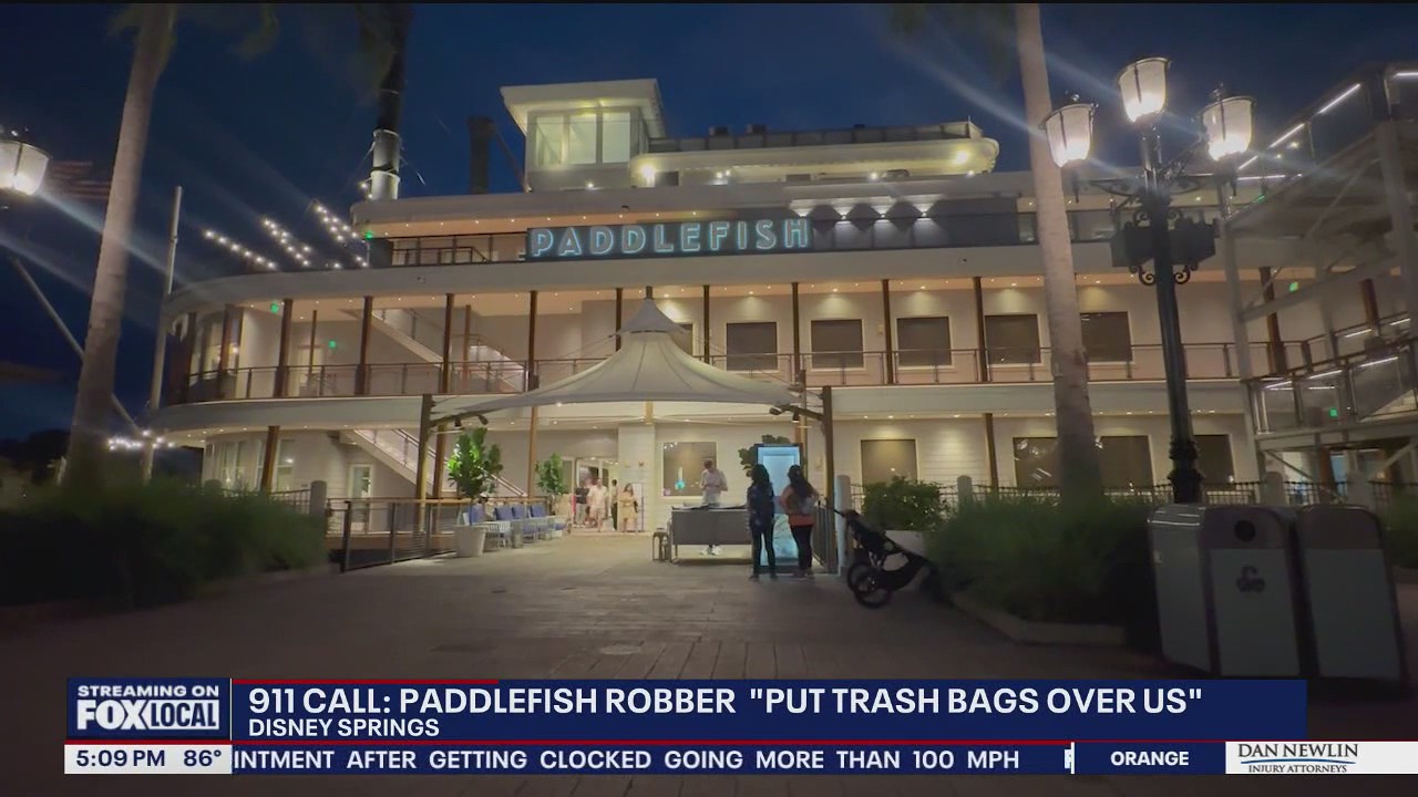 911 call details Paddlefish restaurant robbery at Disney Springs