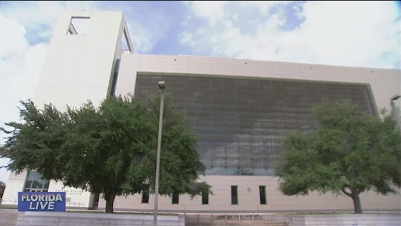 Wildfire arson suspect will remain in custody